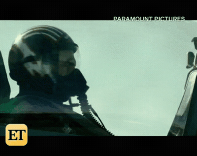 Man In Helmet Sitting In Paramount Picture GIF