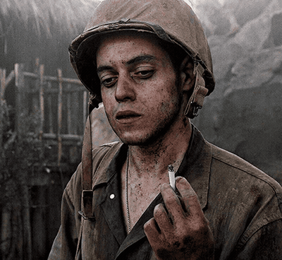 Man In Helmet Smoking Cigarette GIF