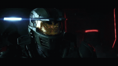 Man In Helmet Standing In Dark GIF