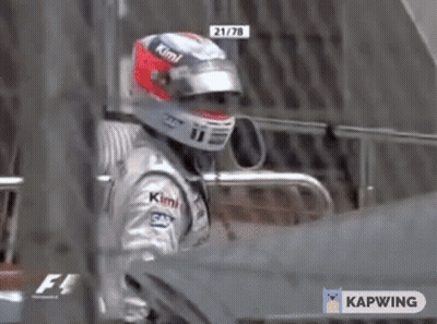 Man In Helmet Standing In Front Of Car GIF