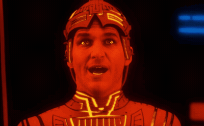Man In Helmet With Letter L Looking At Camera GIF