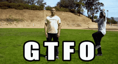 Man in Helvetica Shirt in Field
