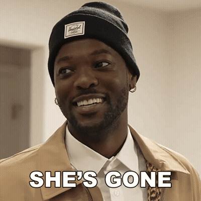 Man In Herschel Beanie Smiling Says She's Gone GIF