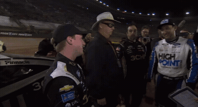 Man In High Point Jacket Shaking Hands With Cowboy Hat GIF