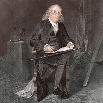 Man In Historical Costume Sitting In Office Chair GIF