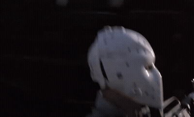 Man In Hockey Helmet Standing By Car GIF