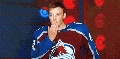 Man In Hockey Jersey Blowing Kiss GIF
