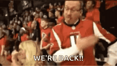 Man In Hockey Jersey Standing In Front Of Crowd GIF
