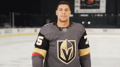 Man In Hockey Jersey Standing On Rink GIF