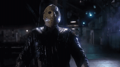 Man In Hockey Mask In Dark Room GIF