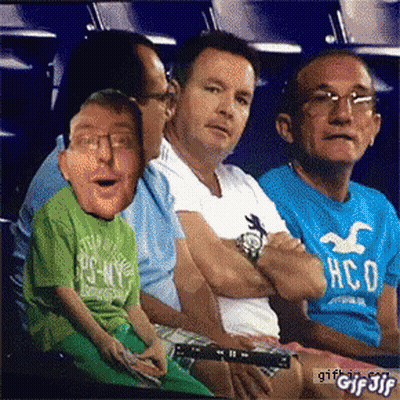 Man In Hollister Shirt Next To Man In Green Shirt GIF