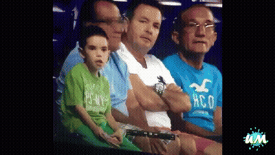 Man In Hollister Shirt Sitting Next To Another Man GIF