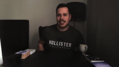 Man In Hollister T-Shirt Pouring Coffee GIF