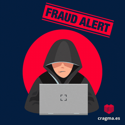Man In Hood Using Laptop With Fraud Alert Stamp GIF