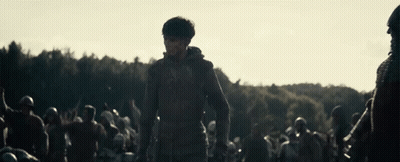 Man In Hooded Jacket Before Crowd GIF
