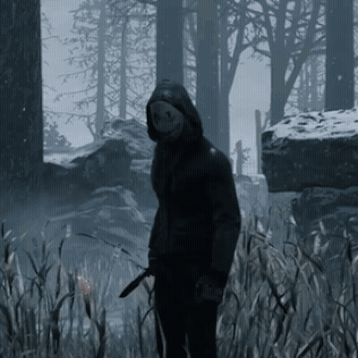 Man In Hooded Jacket Holding Knife In Forest GIF