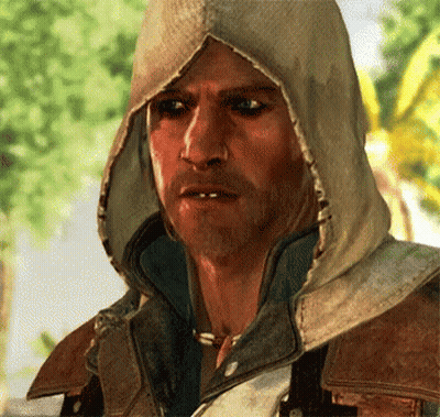Man In Hooded Jacket Looking At Camera GIF