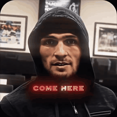 Man In Hooded Jacket Saying Come Here GIF