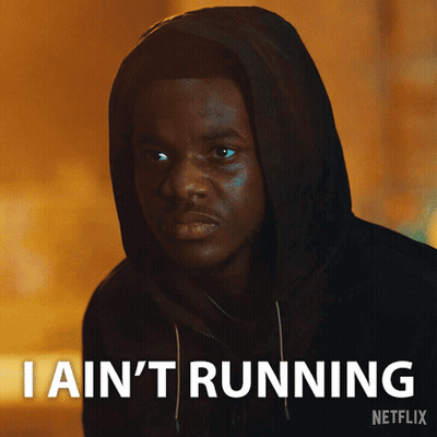 Man In Hooded Jacket Says I Ain't Running GIF