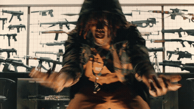 Man In Hooded Jacket Screaming At Gun Display GIF