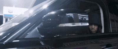 Man In Hooded Jacket Sitting In Car With Tampa GIF