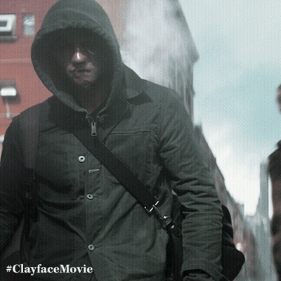 Man in Hooded Jacket Walking Down Street #clayfacemovie