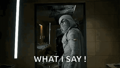 Man In Hooded Jacket With Glowing Eyes Saying What I Say! GIF