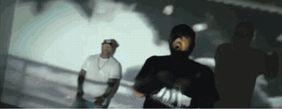 Man In Hooded Shirt Dancing With Man In White Shirt GIF