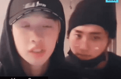 Man In Hoodie And Hat Beside Man In Hat GIF