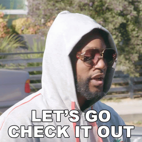 Man In Hoodie And Sunglasses Saying Let's Go Check It Out GIF
