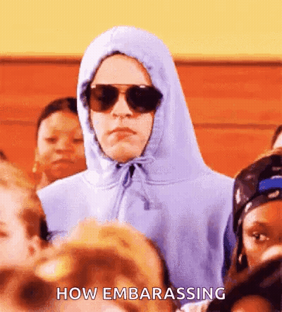 Man In Hoodie And Sunglasses Says How Embarrassing GIF