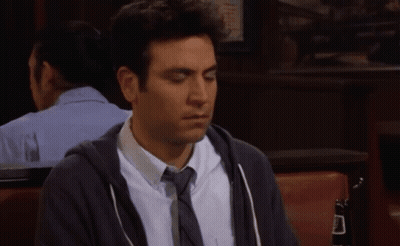 Man In Hoodie And Tie Sitting In Chair GIF