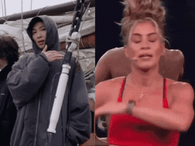 Man In Hoodie And Woman In Red Top GIF
