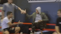 Man In Hoodie Doing Multiple Dap GIF