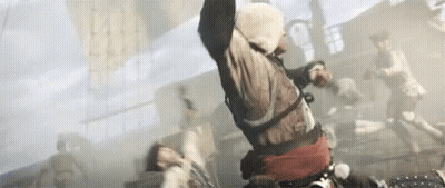 Man In Hoodie Jumping As People Run GIF