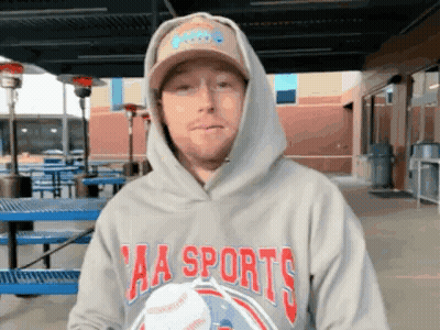 Man In Hoodie Saying Sports GIF