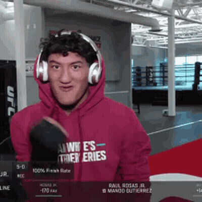 Man In Hoodie Saying UFC With Headphones GIF