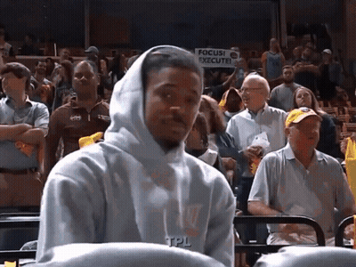 Man In Hoodie Sitting In Front Of Focus Execute Sign GIF
