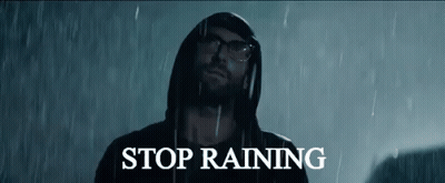 Man In Hoodie Standing In Rain Saying Stop Raining GIF