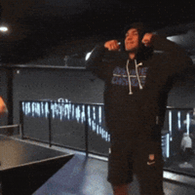 Man In Hoodie With Number 4 GIF