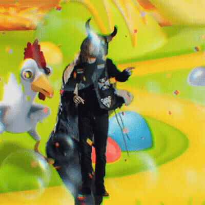 Man In Horned Mask With Cartoon Chicken GIF