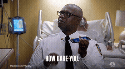 Man In Hospital Bed Holding Cell Phone Saying How Dare You GIF
