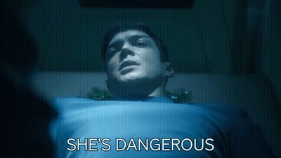 Man In Hospital Bed Saying She's Dangerous GIF