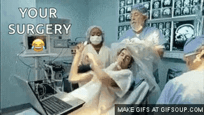 Man In Hospital Bed With Laptop During Surgery GIF