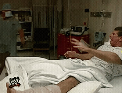 Man In Hospital Bed With W Logo On Foot GIF