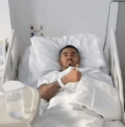 Man In Hospital Gown Giving Thumbs Up GIF