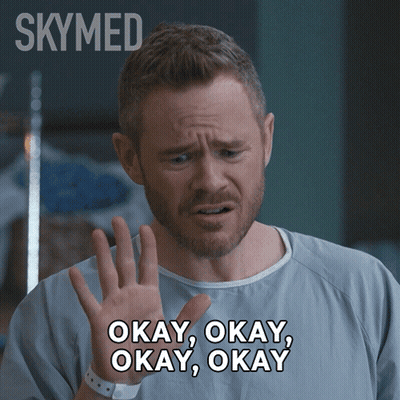 Man In Hospital Gown Saying Okay GIF
