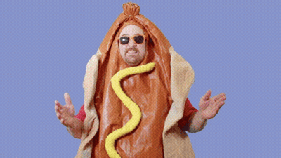 Man In Hot Dog Costume Surrounded By Dollar Bills Saying It's Pay Day GIF