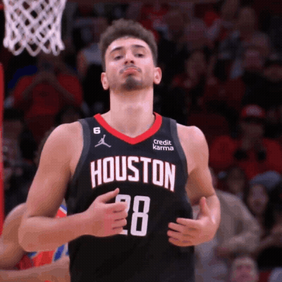 Man In Houston 28 Jersey In Front Of Basketball Net GIF