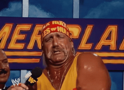 Man In Hulk Hogan Headband Talking Into Mic GIF